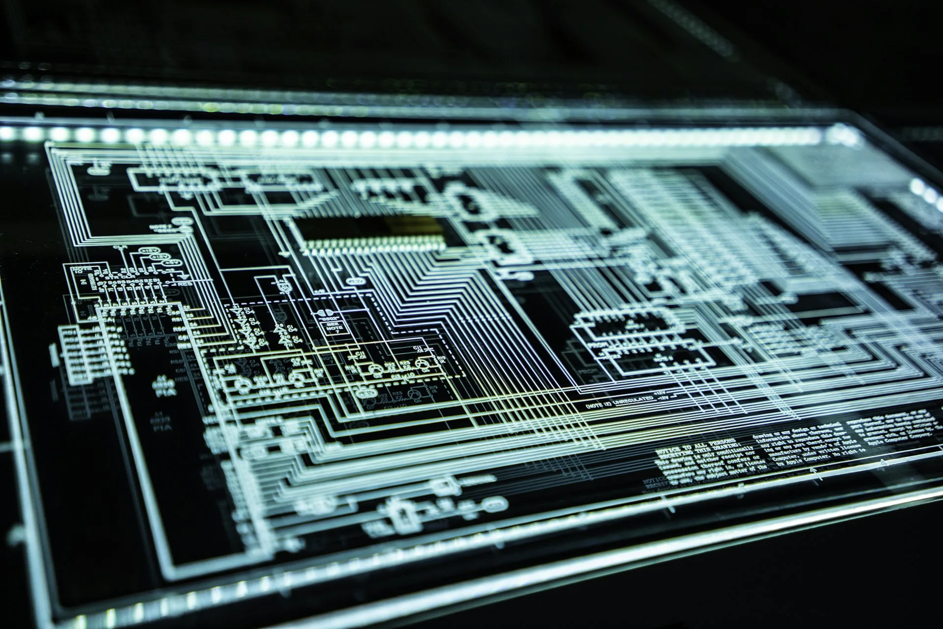 VAPT testing — motherboard circuit board close-up with glowing green accents